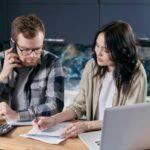 couple filling out paperwork